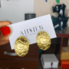 Gold oval earrings
