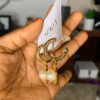 Gold earring with pearls