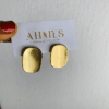 Flat top gold earring